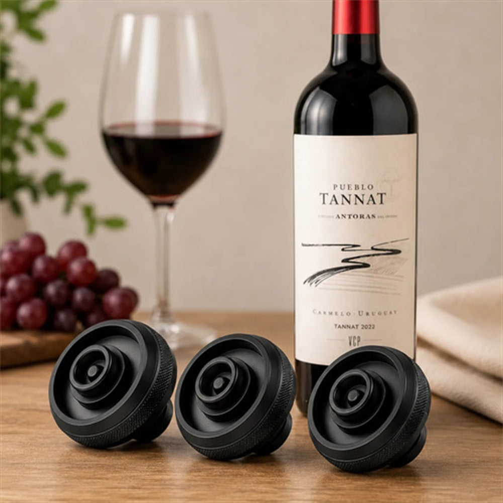 Tapones de vacío sobre una botella de vino